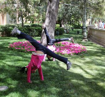 Happiness is doing cartwheels with a friend over spring break